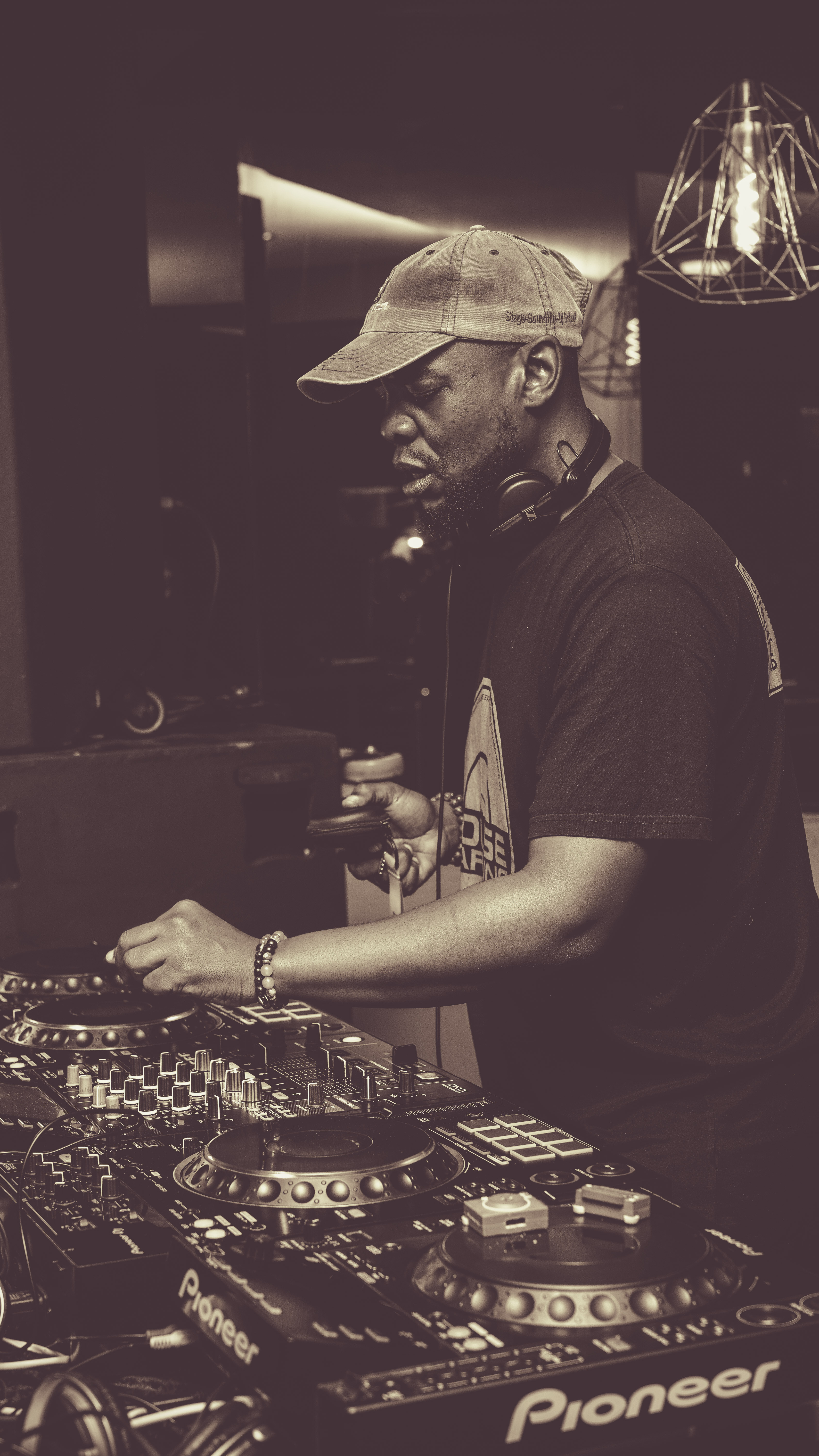 Black and white DJ photo in professional setting